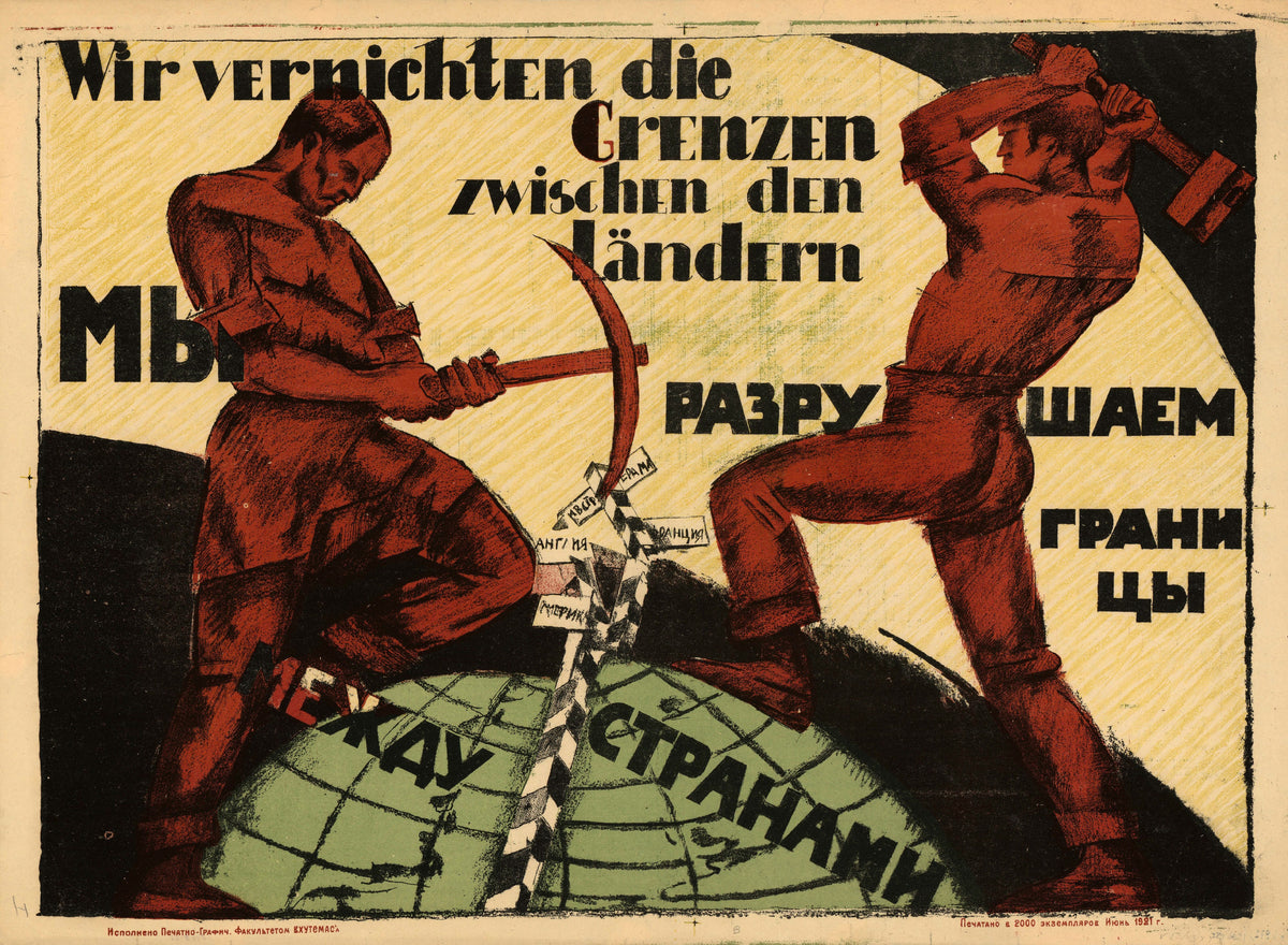 We are destroying the borders between countries — Two workers smash a frontier post on a green globe