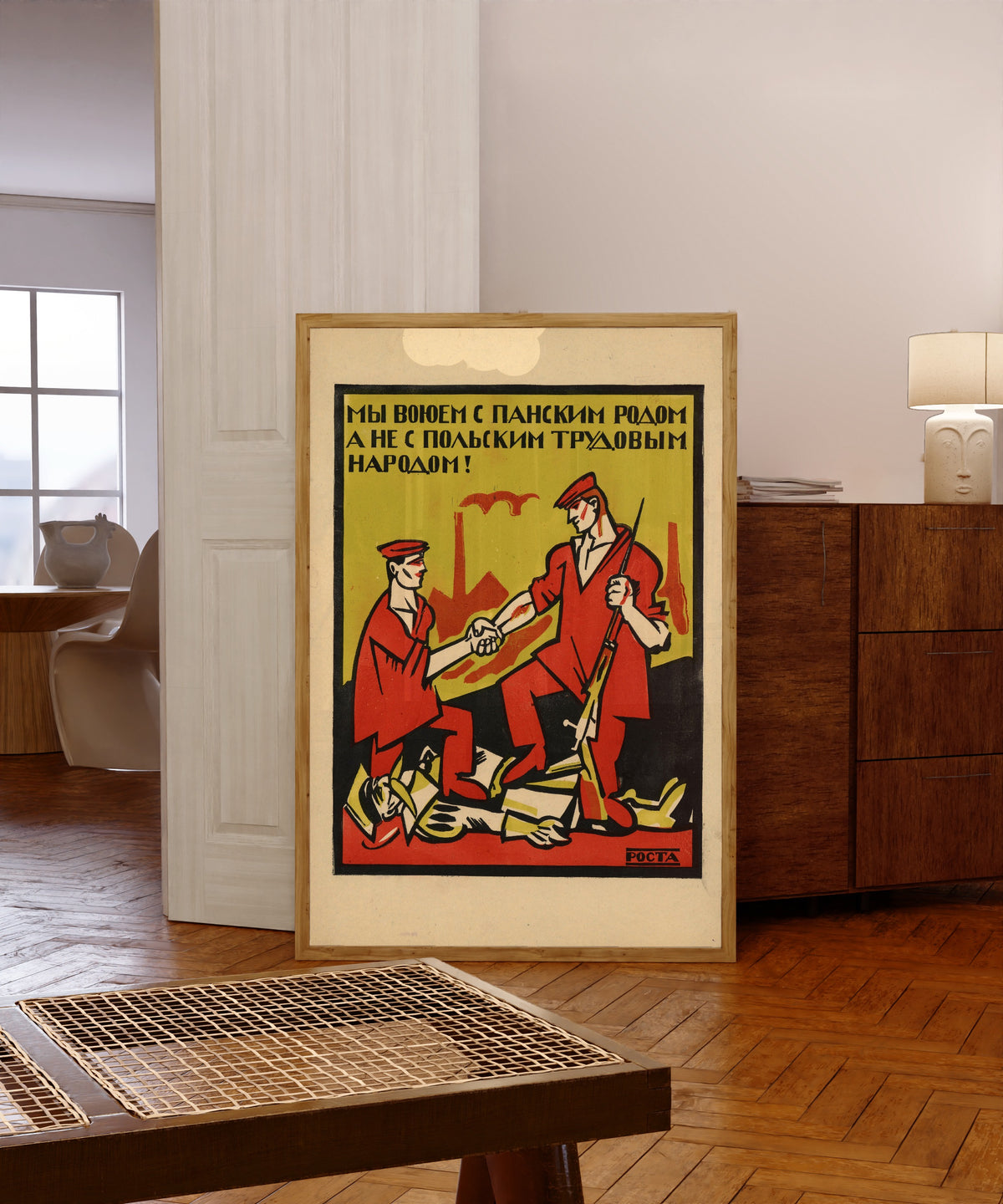 Framed art print of We are fighting the lordly gentry, not the Polish… by Ivan Malyutin, in a light wood frame leaning in a warm room with a parquet floor