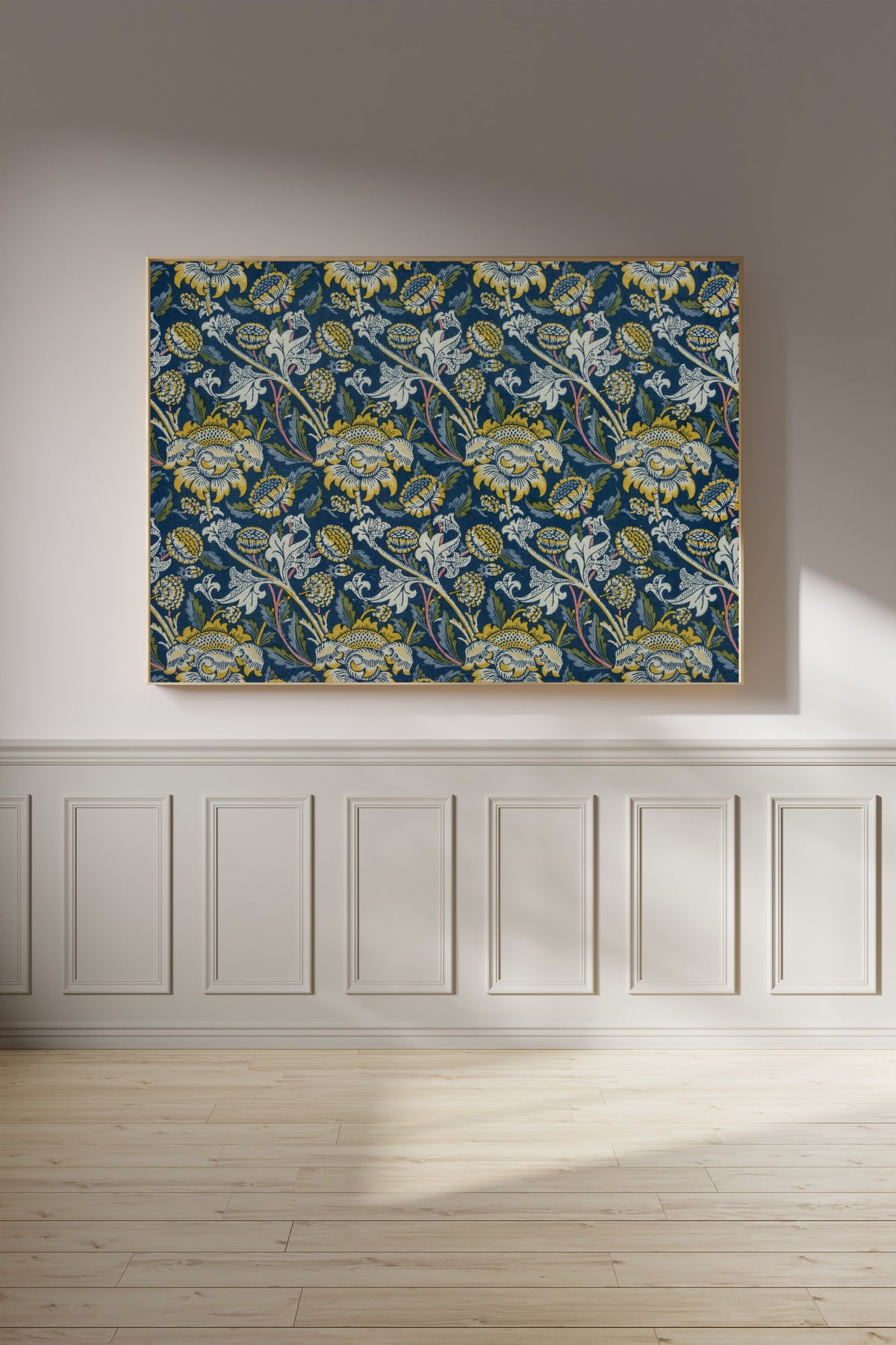 Framed art print of Wey (Blue) by William Morris, on a panelled wall in afternoon light