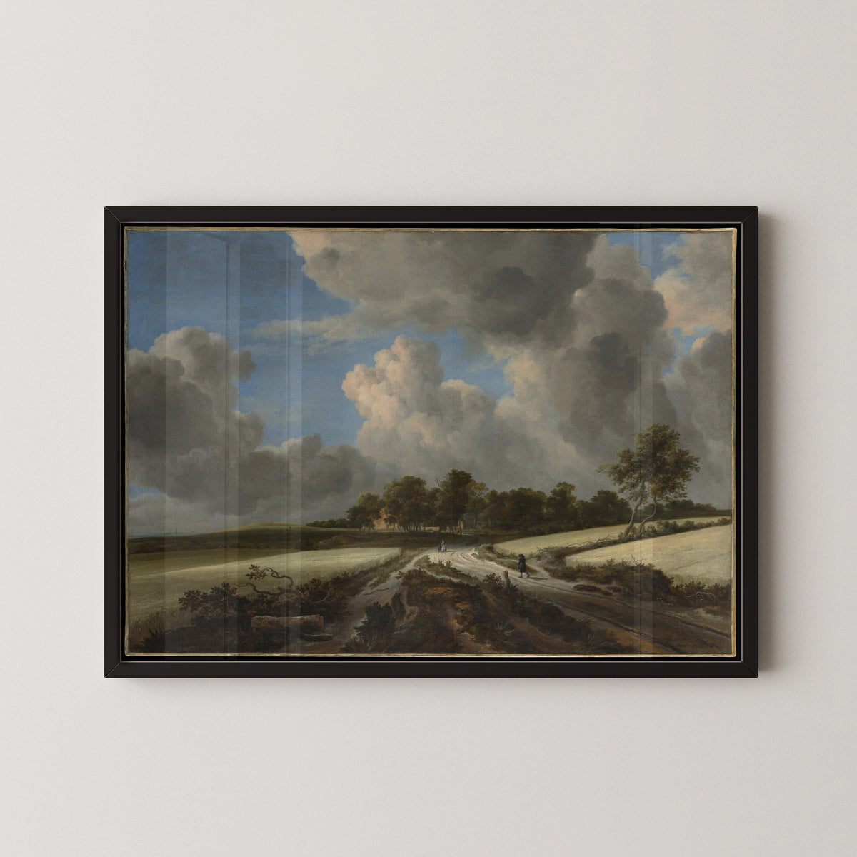 Wheat Fields by Jacob van Ruisdael — in a black frame on a pale wall