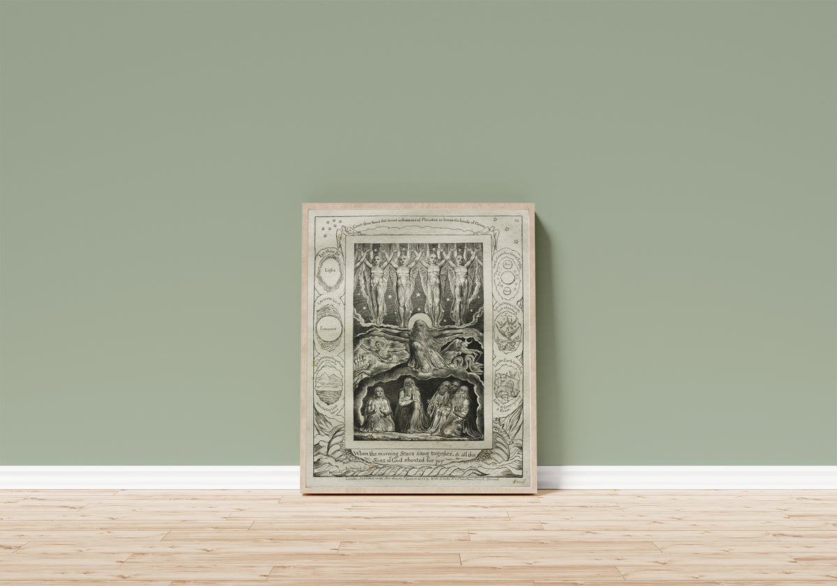 Framed art print of When the Morning Stars Sang Together (Book of… by William Blake, in a light wood frame leaning on a sage green wall above a wooden floor