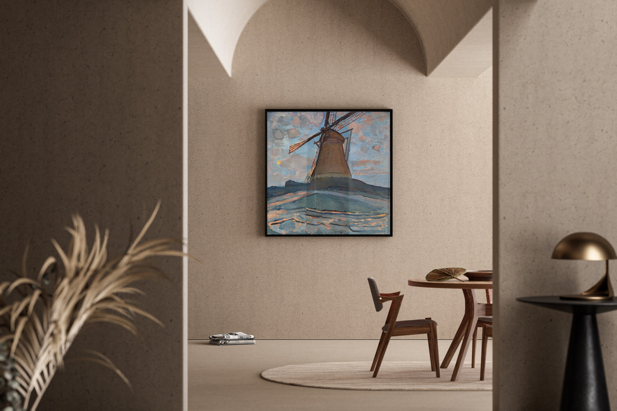 Framed art print of Windmill by Piet Mondrian, in a sunlit dining corner