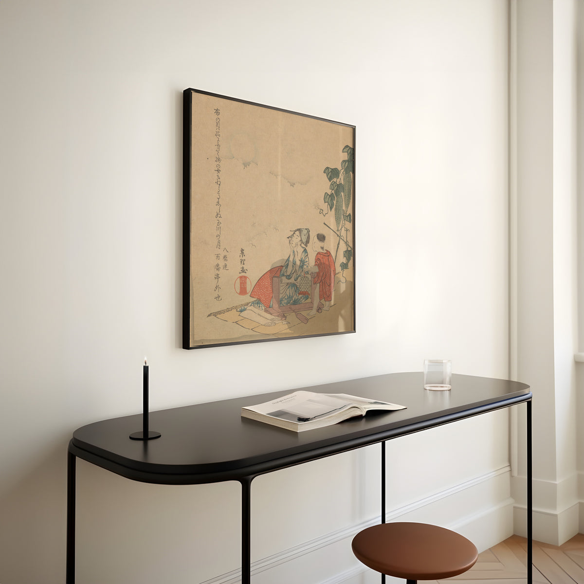 Framed art print of Woman and Boy with Melon Plant by Katsushika Hokusai, above a slim black console table