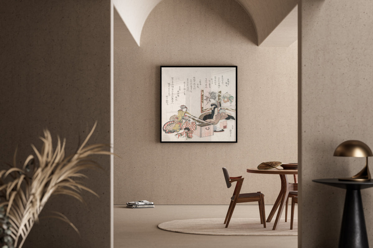Framed art print of Women Preparing Tea Around the Fire-Holder by Katsushika Hokusai, in a sunlit dining corner