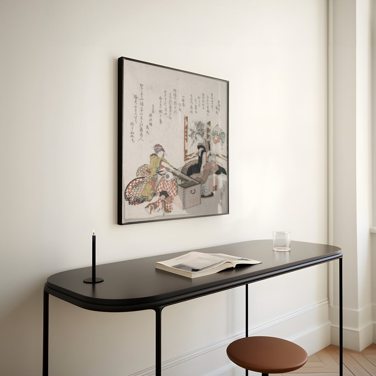Framed art print of Women Preparing Tea Around the Fire-Holder by Katsushika Hokusai, above a slim black console table