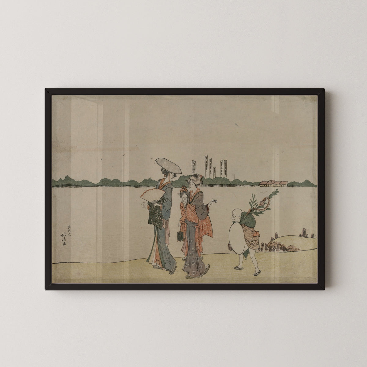 Framed art print of Women and Children Walking Along the Sumida River by Katsushika Hokusai, in a black frame on a pale wall