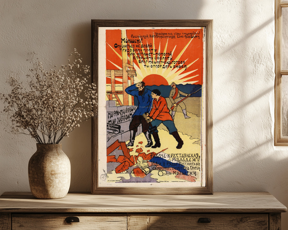 Framed art print of Working-class and peasant youth! Join the ranks of the Russian…, in a dark wood frame leaning on a rustic console beside dried flowers