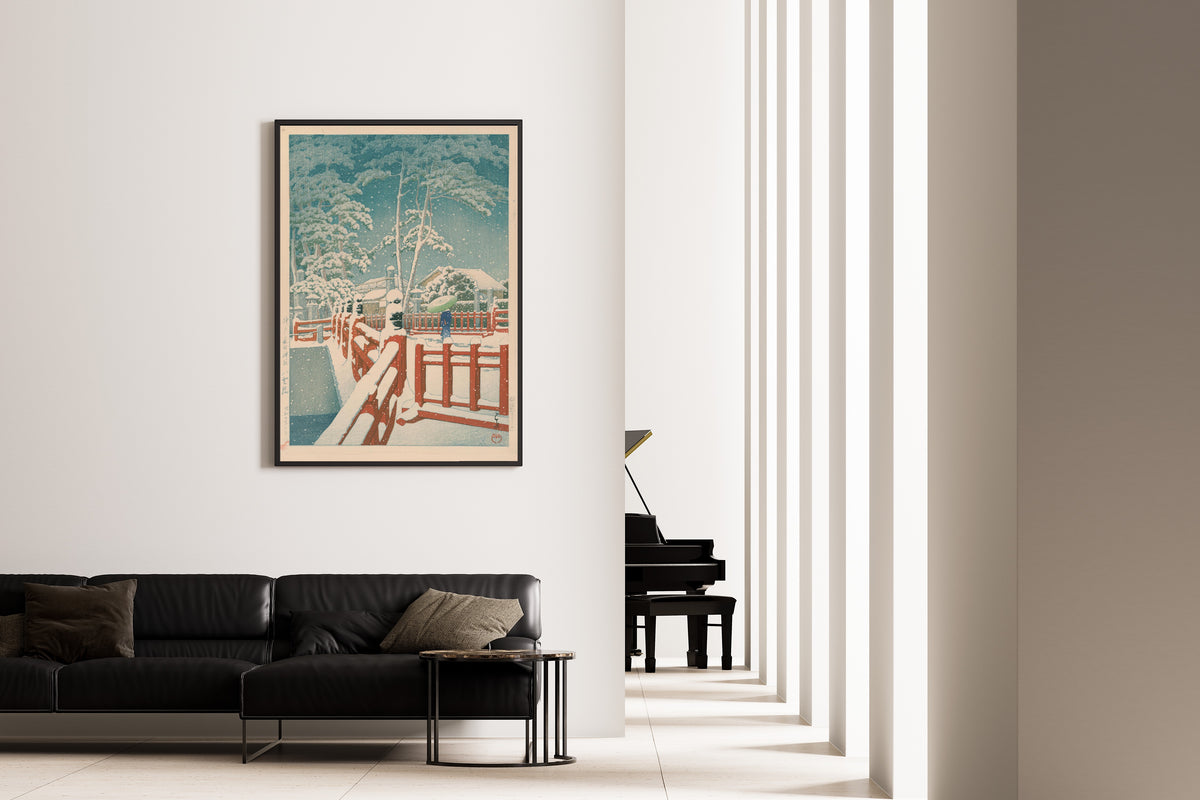 Framed art print of Yakumo Bridge at Nagata Shrine, Kobe by Kawase Hasui, on the wall of a minimal living room