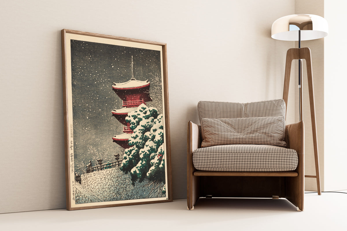 Framed art print of Yasugi Kiyomizu Temple at Izumo by Kawase Hasui, leaning against a wall beside an armchair and a floor lamp