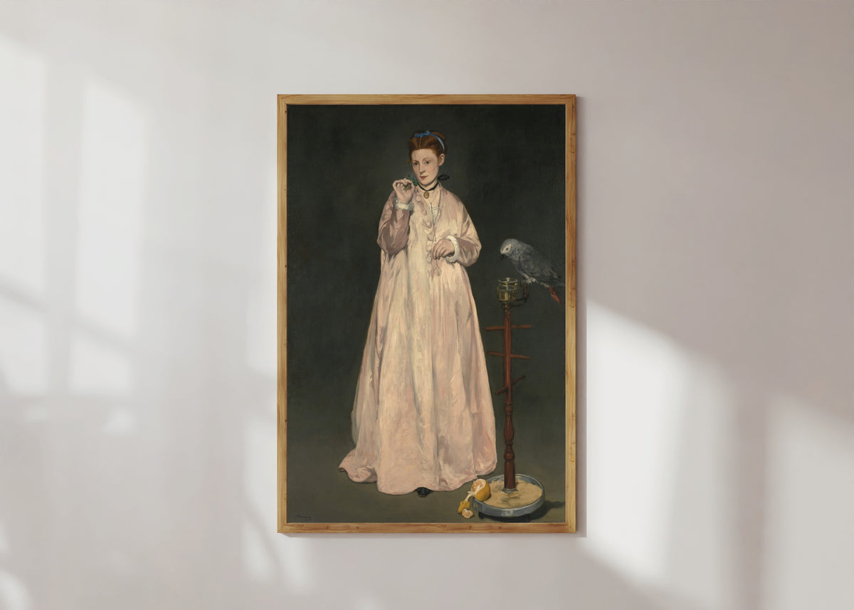 Framed art print of Young Lady in 1866 by Édouard Manet, in a light wood frame on a sunlit white wall