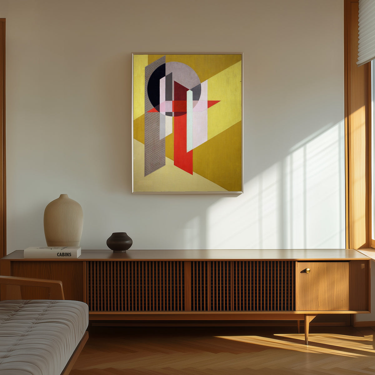 Framed art print of Z VII by László Moholy-Nagy, in a thin light frame on a sunlit wall above a wooden sideboard