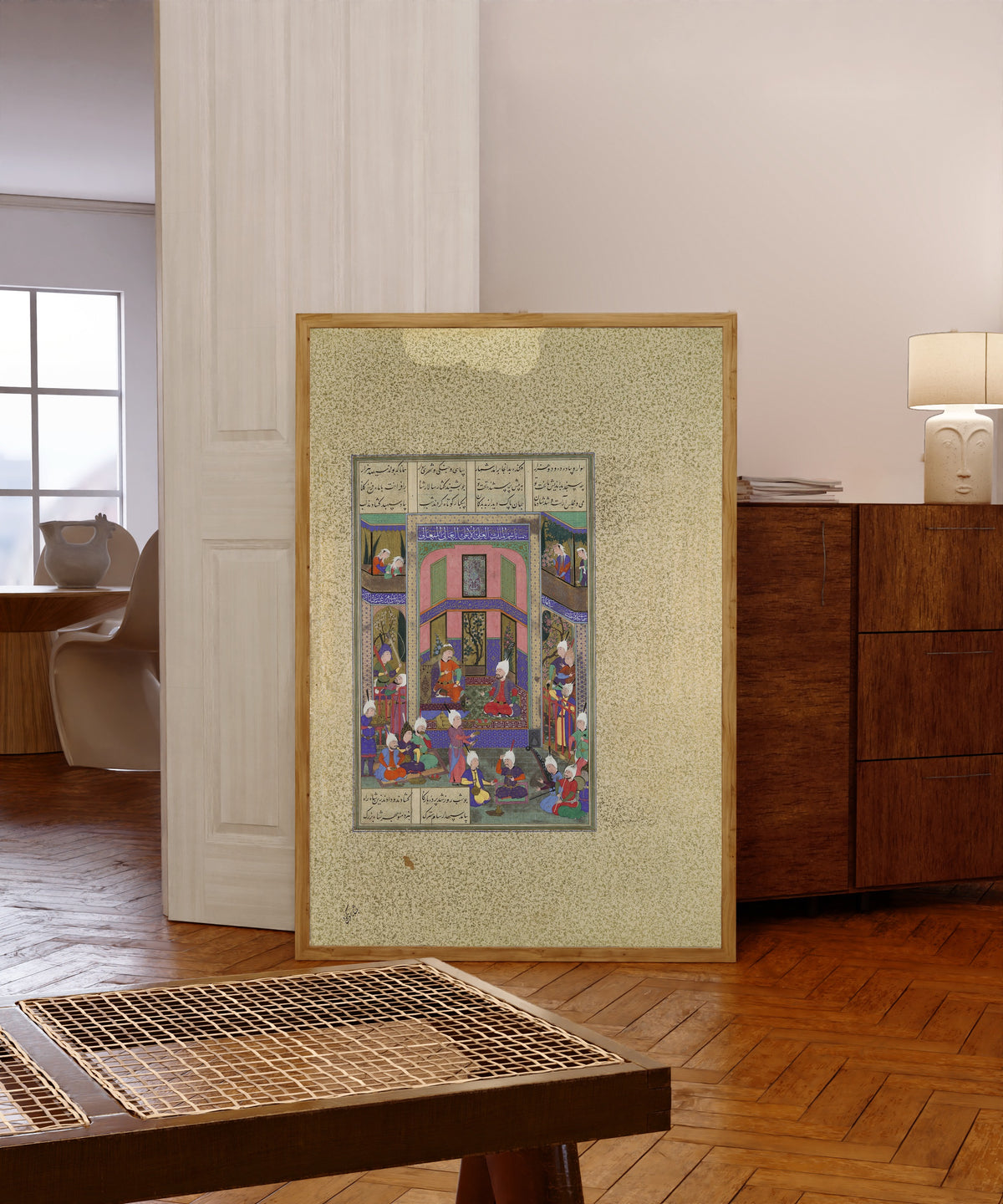 Framed art print of Shahnama of Shah Tahmasp: Manuchihr… by Abd al-Aziz (attributed), in a light wood frame leaning in a warm room with a parquet floor
