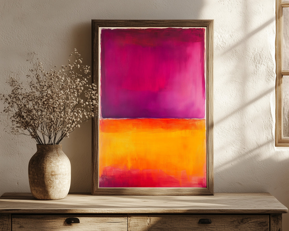Framed art print of Orange and Purple (Colour Field) by After Mark Rothko, in a dark wood frame leaning on a rustic console beside dried flowers
