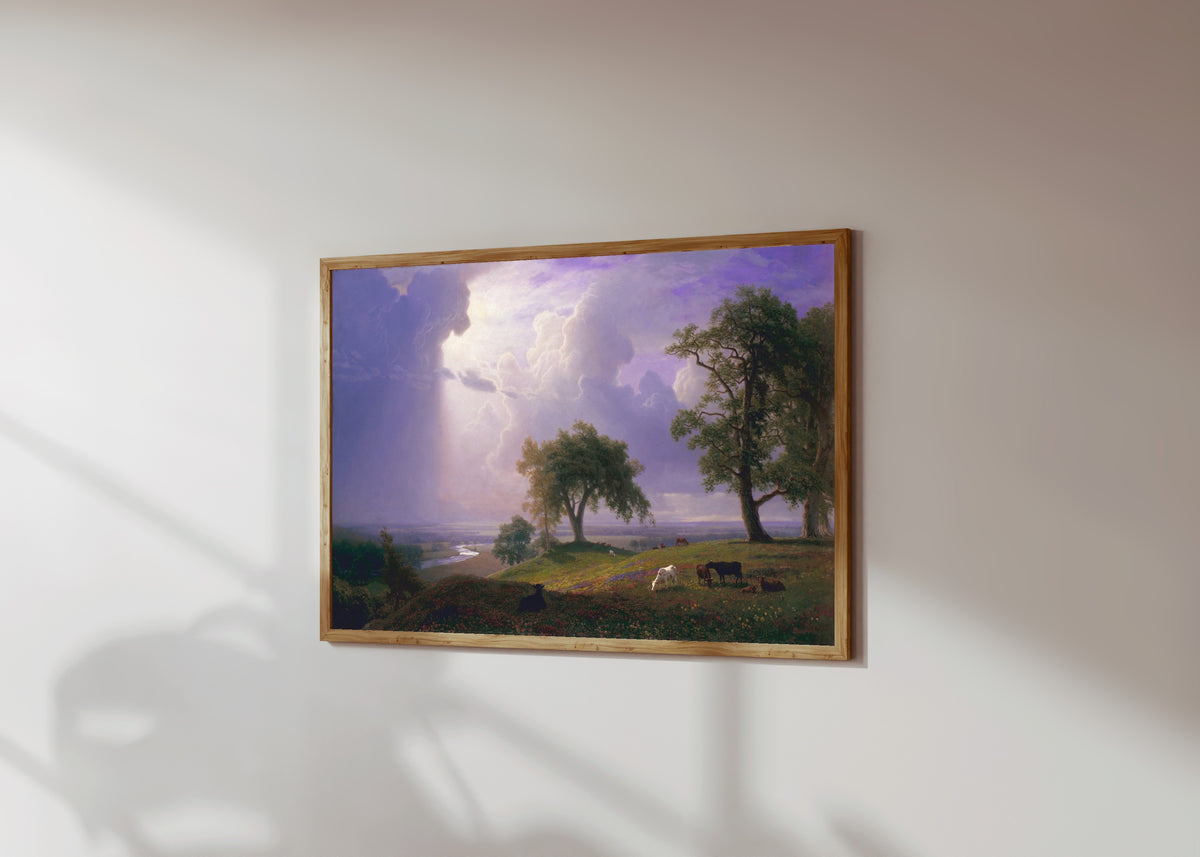 Framed art print of California Spring by Albert Bierstadt, in a light wood frame on a sunlit white wall, seen at a slight angle