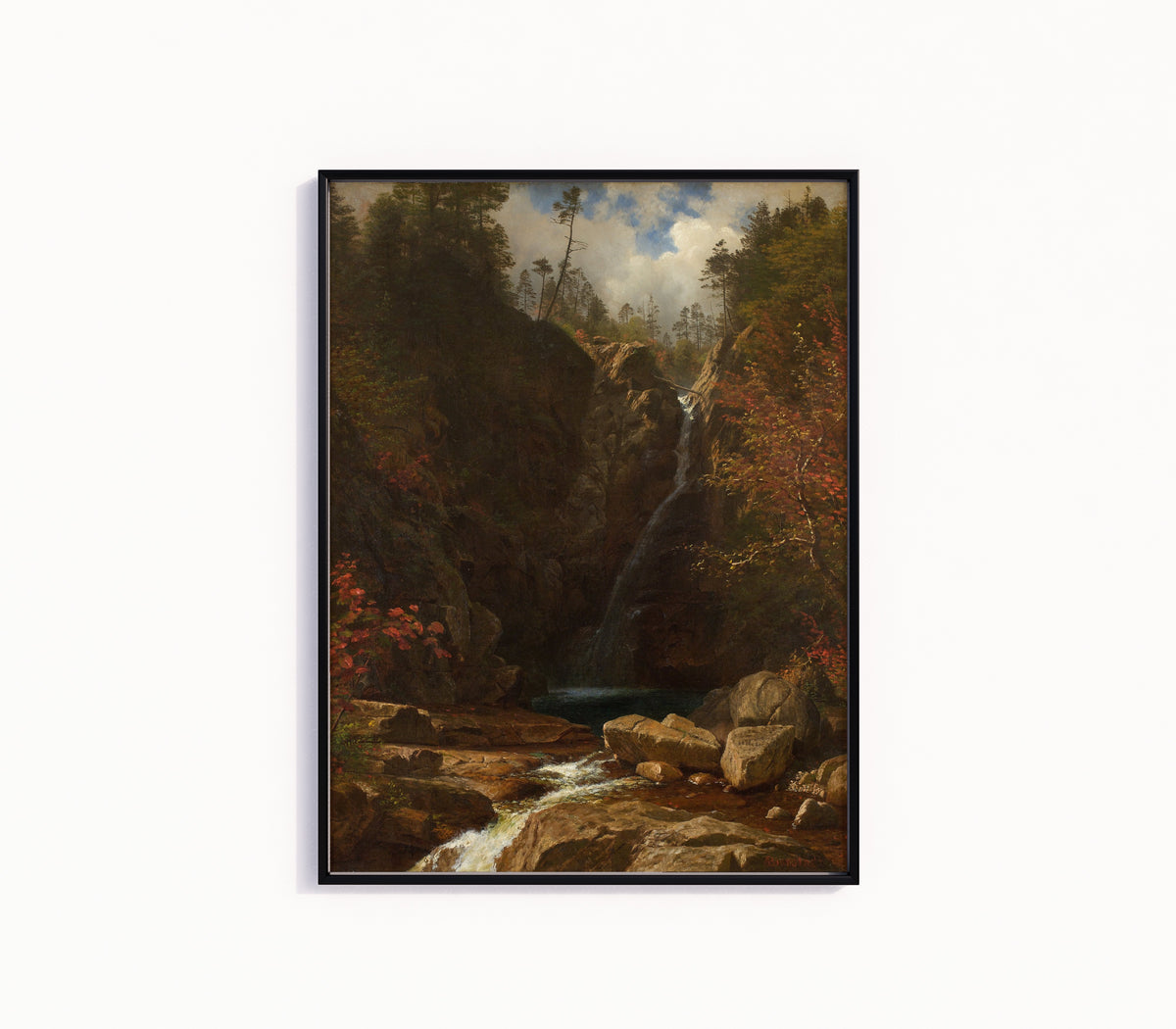 Framed art print of Glen Ellis Falls by Albert Bierstadt, in a slim black frame on a plain white wall