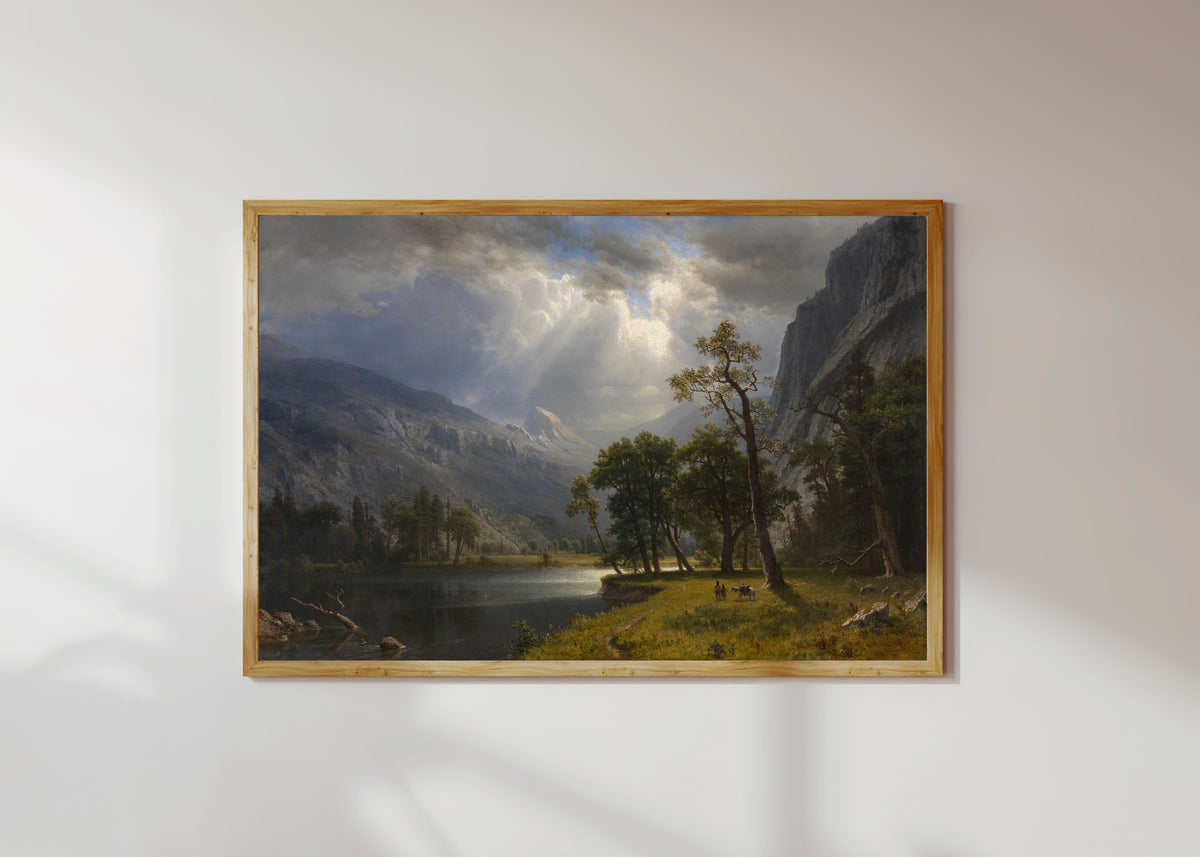 Framed art print of Mount Starr King by Albert Bierstadt, in a light wood frame on a sunlit white wall