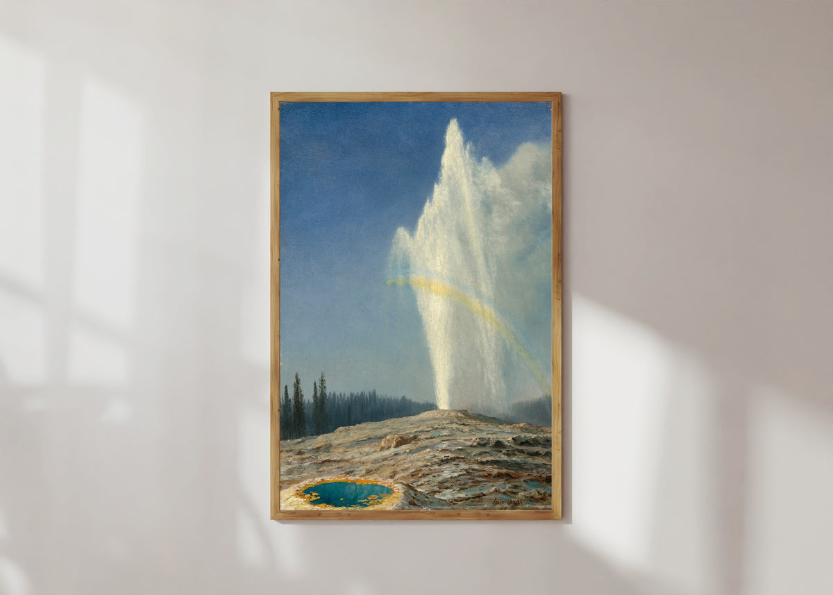 Framed art print of Old Faithful by Albert Bierstadt, in a light wood frame on a sunlit white wall