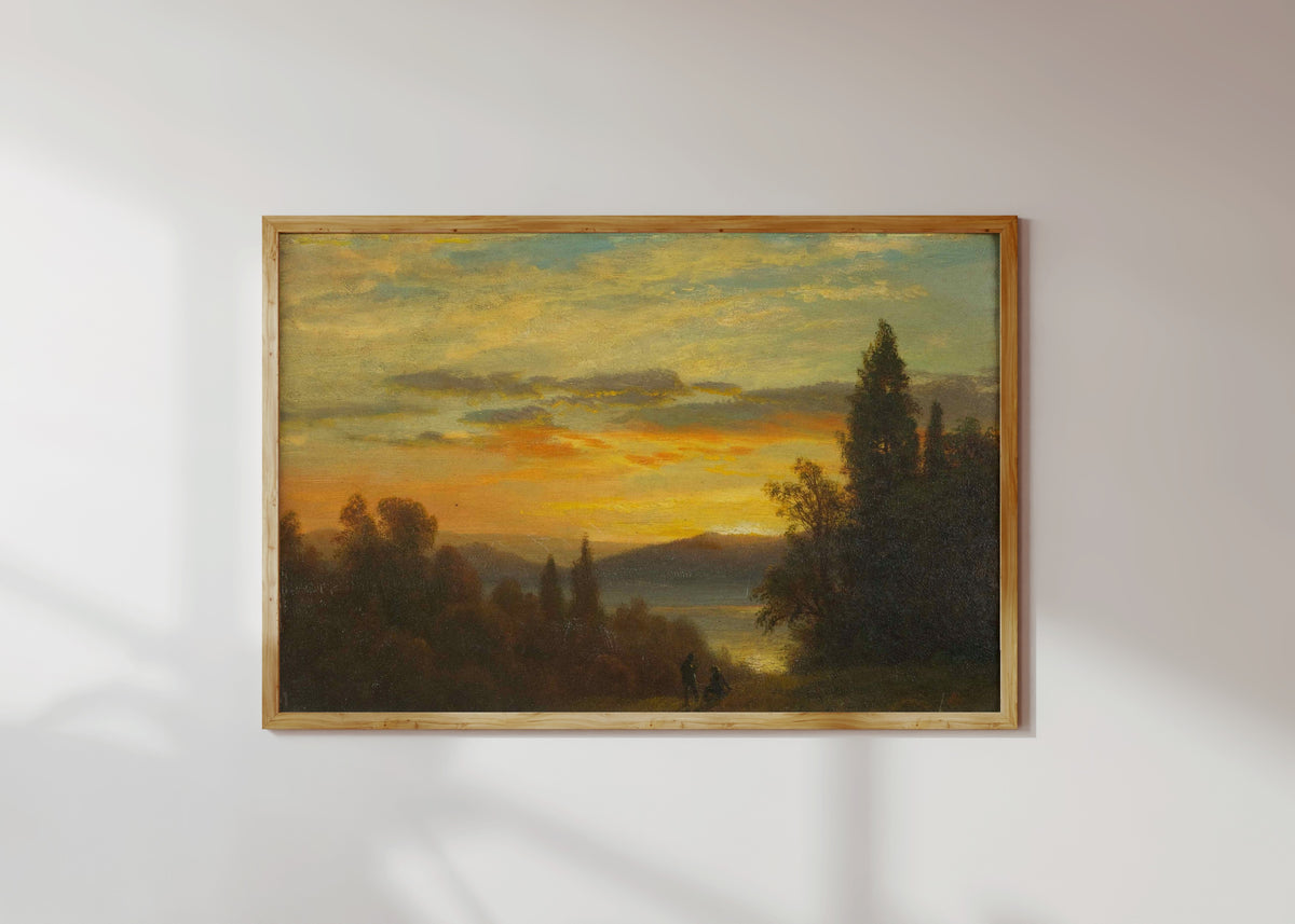 Framed art print of On the Hudson River Near Irvington by Albert Bierstadt, in a light wood frame on a sunlit white wall