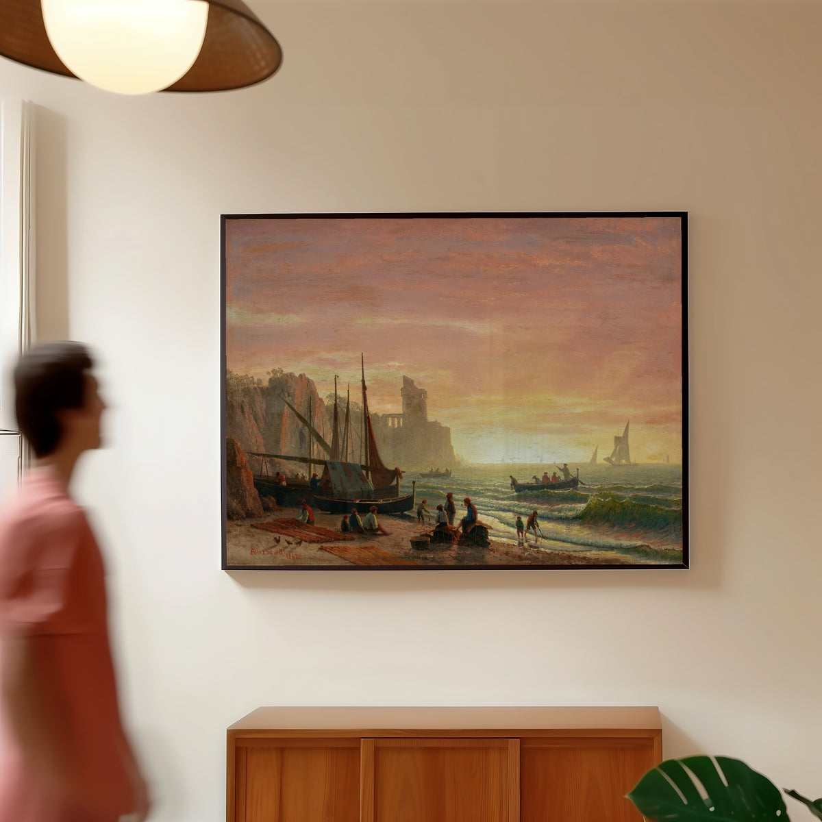 Framed art print of The Fishing Fleet by Albert Bierstadt, in a slim black frame on a warm wall in a sunlit room
