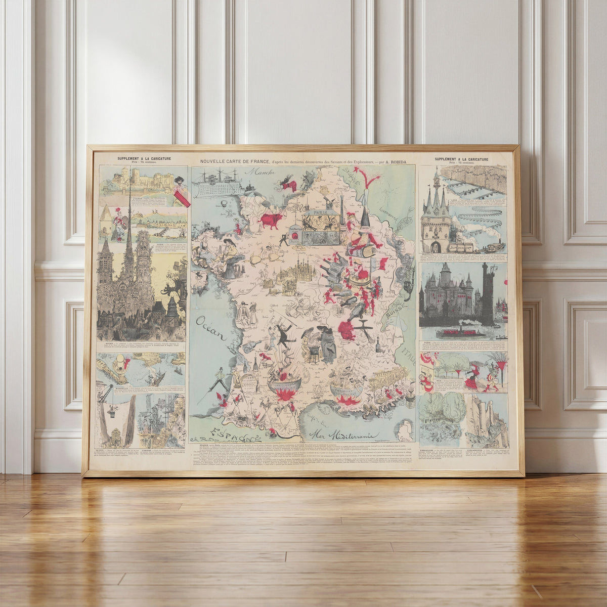 Framed art print of New Map of France, After the Latest Discoveries of the… by Albert Robida, in a light wood frame leaning against a panelled white wall