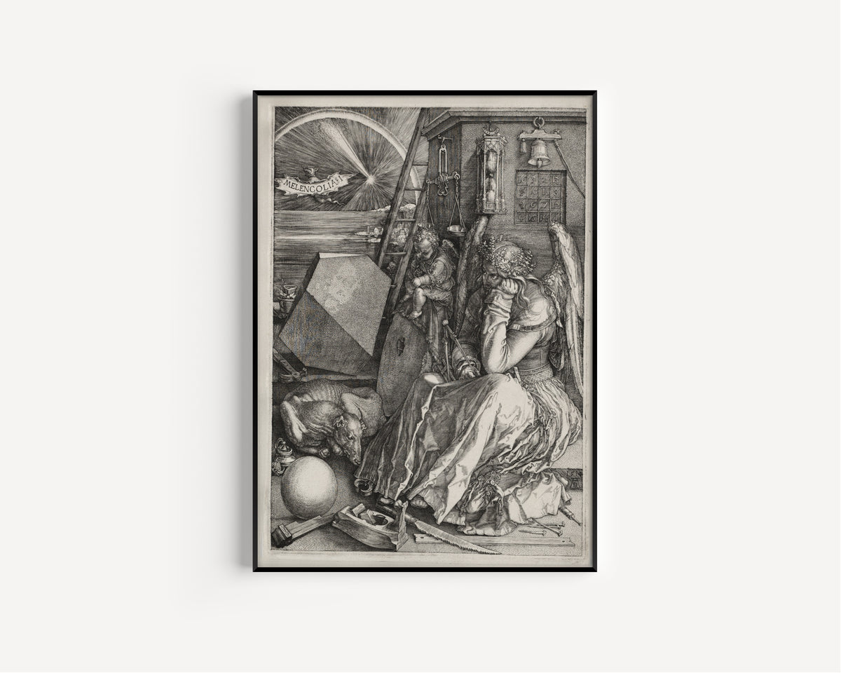 Framed art print of Melencolia I by Albrecht Dürer, in a slim black frame on a plain white wall