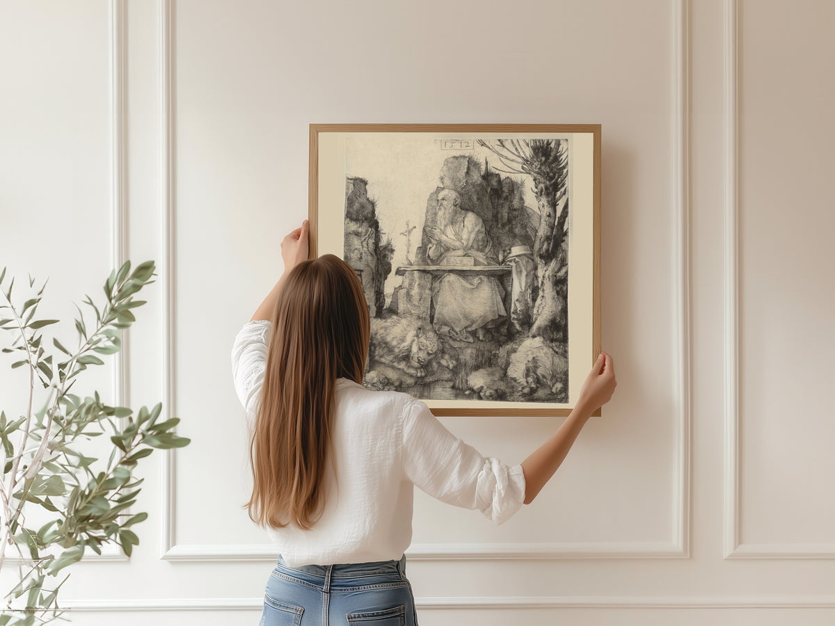 Framed art print of St Jerome in the Wilderness by Albrecht Dürer, hung on a panelled wall