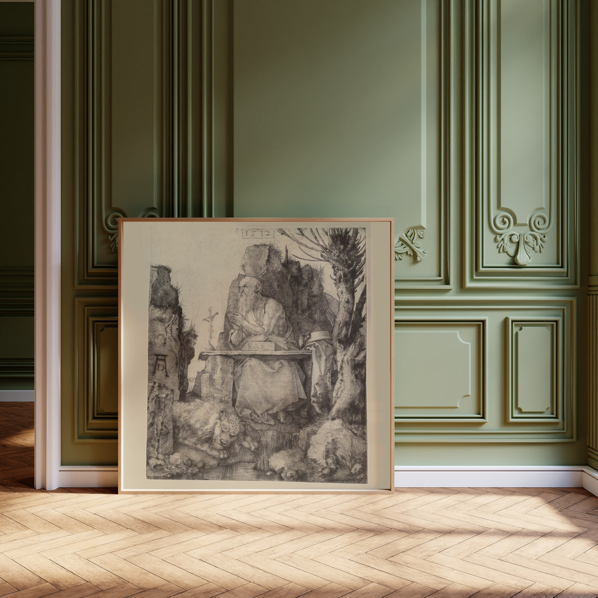 Framed art print of St Jerome in the Wilderness by Albrecht Dürer, leaning against olive-green panelling on a herringbone floor