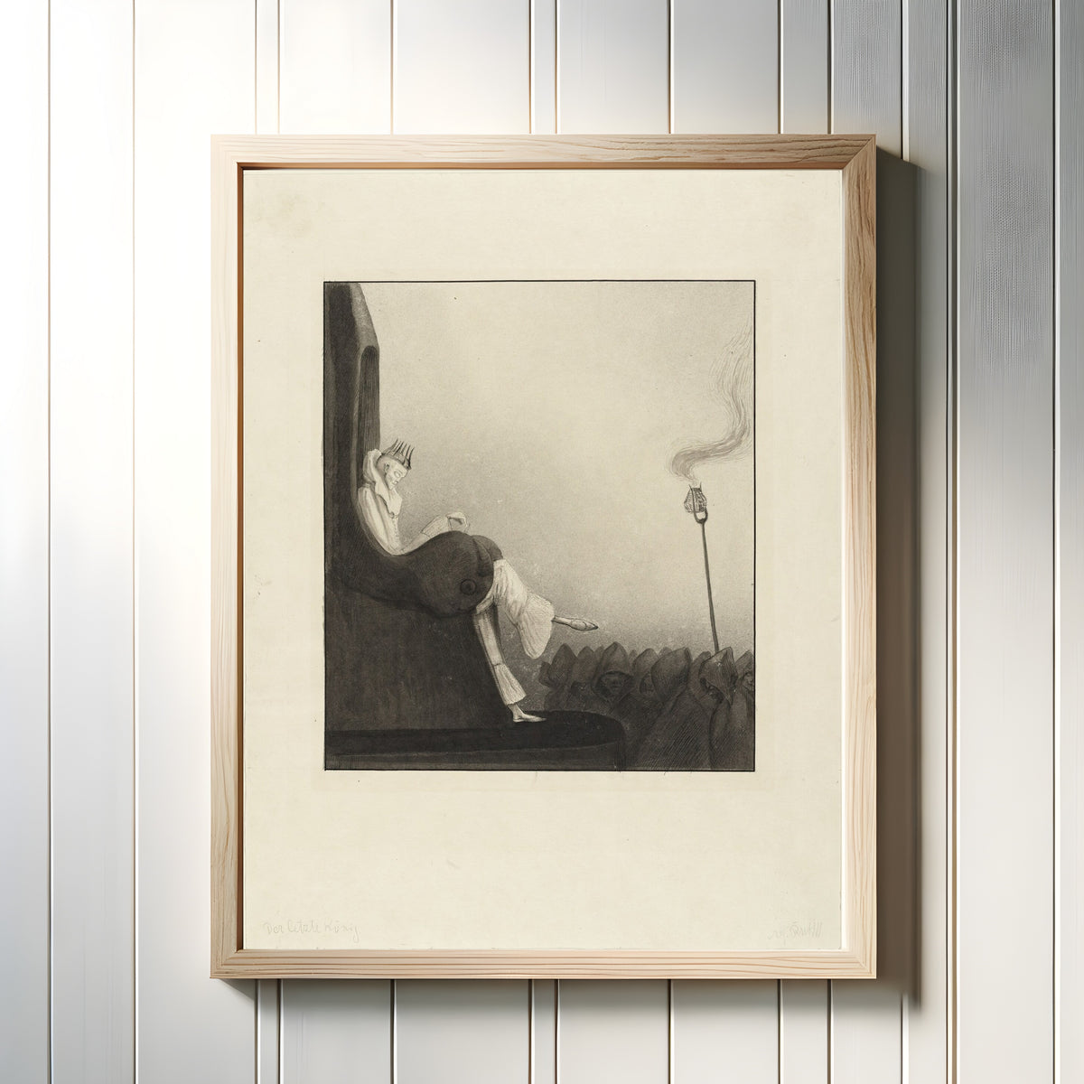Framed art print of The Last King by Alfred Kubin, in a light wood frame on a white panelled wall