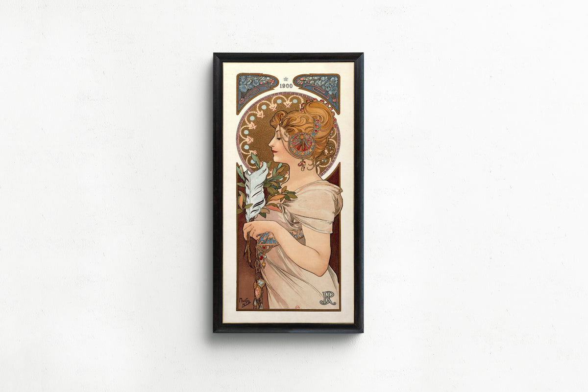 Framed art print of La Plume by Alphonse Mucha, in a slim black frame on a plain white wall