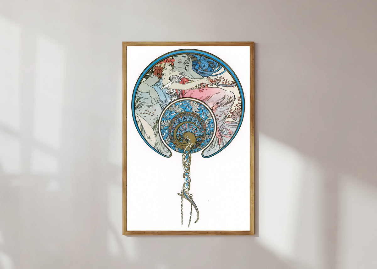 Framed art print of The Passing Wind Takes Youth Away by Alphonse Mucha, in a light wood frame on a sunlit white wall