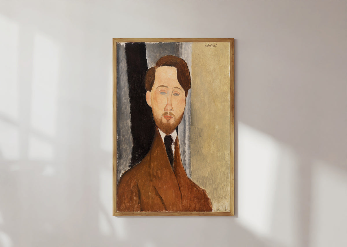 Framed art print of Léopold Zborowski by Amedeo Modigliani, in a light wood frame on a sunlit white wall