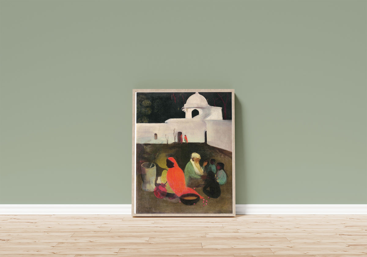 Framed art print of Ancient Story Teller (1940) by Amrita Sher-Gil, in a light wood frame leaning on a sage green wall above a wooden floor