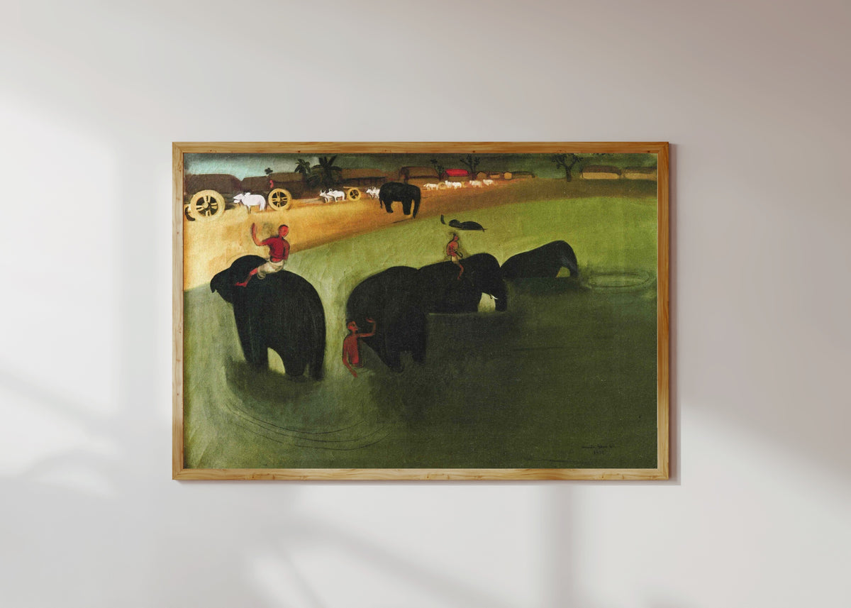 Framed art print of Elephants Bathing in a Green Pool (1938) by Amrita Sher-Gil, in a light wood frame on a sunlit white wall