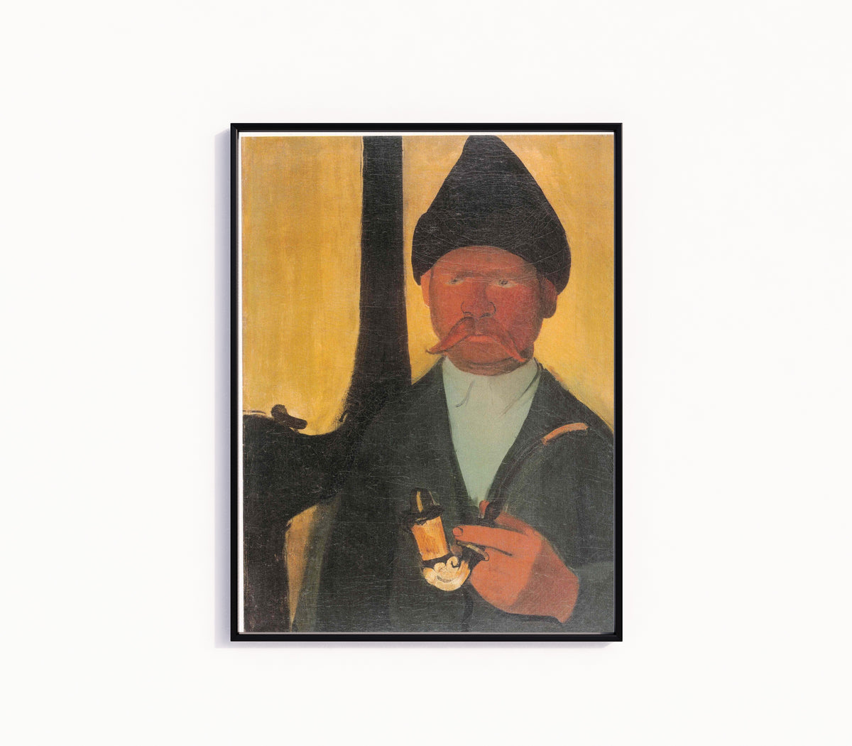 Framed art print of Hungarian Peasant (1938) by Amrita Sher-Gil, in a slim black frame on a plain white wall