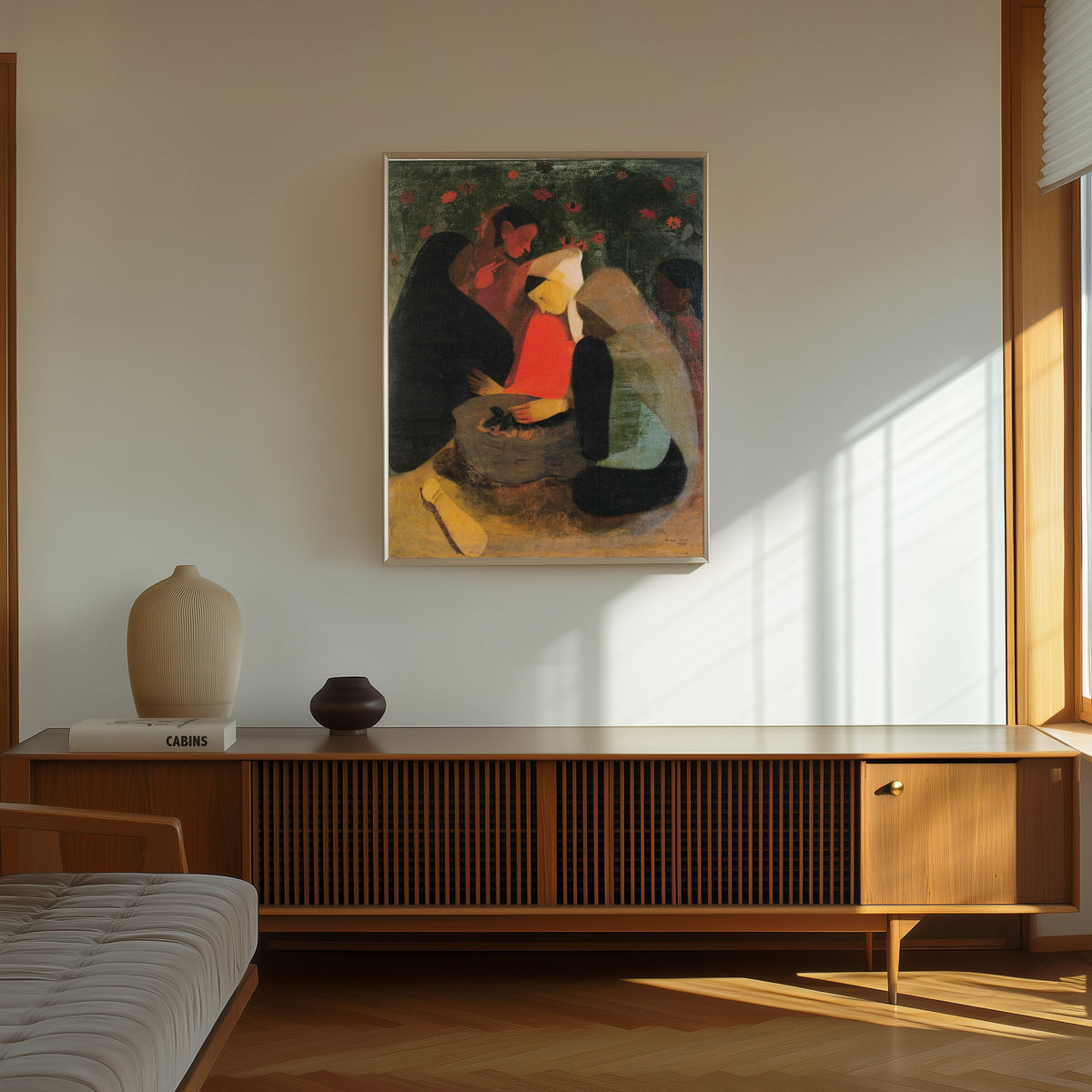 Framed art print of Resting (1939) by Amrita Sher-Gil, in a thin light frame on a sunlit wall above a wooden sideboard