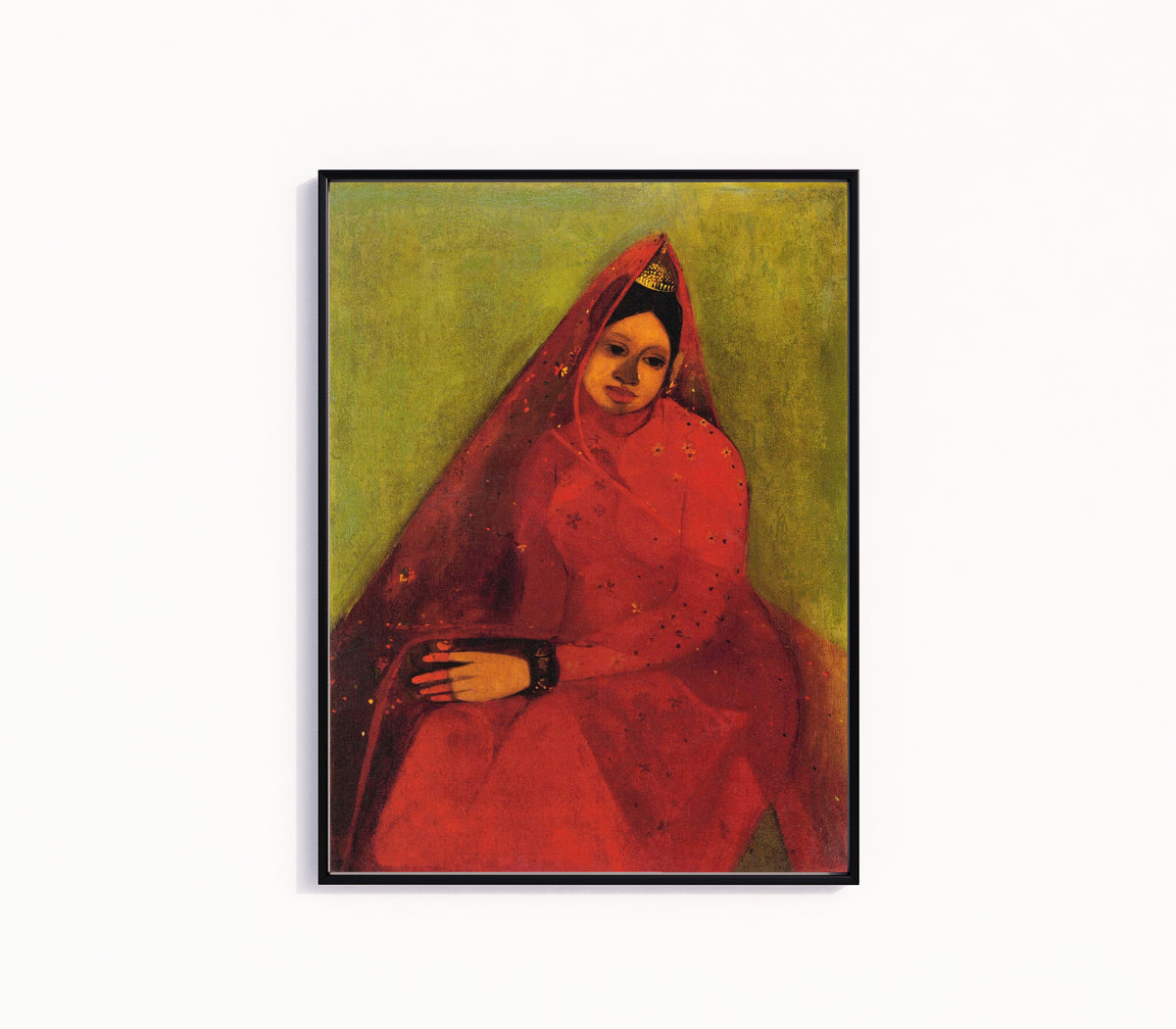 Framed art print of The Bride (1940) by Amrita Sher-Gil, in a slim black frame on a plain white wall