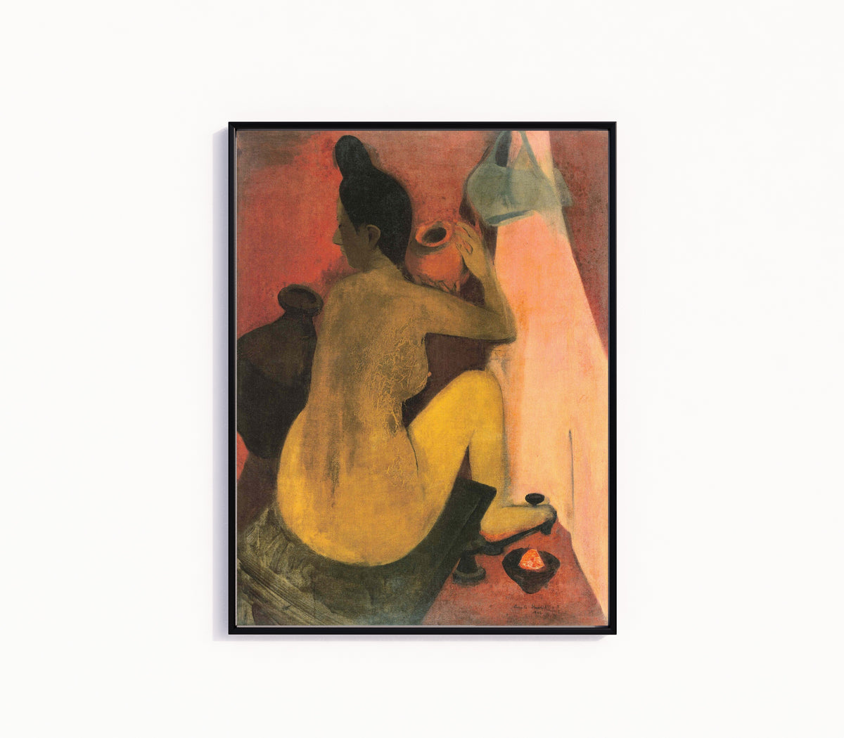 Framed art print of Woman at Bath (1940) by Amrita Sher-Gil, in a slim black frame on a plain white wall