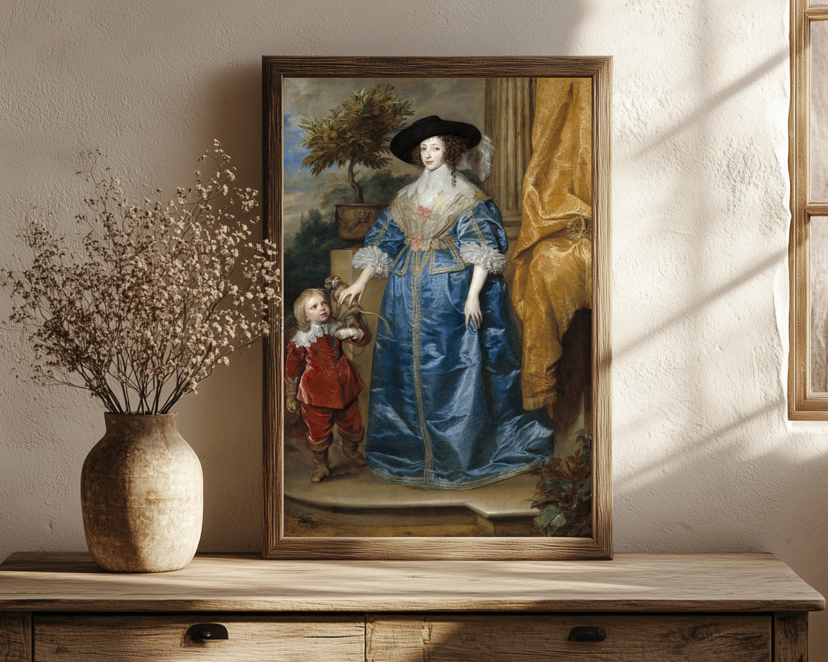 Framed art print of Queen Henrietta Maria with Sir Jeffrey Hudson by Anthony van Dyck, in a dark wood frame leaning on a rustic console beside dried flowers