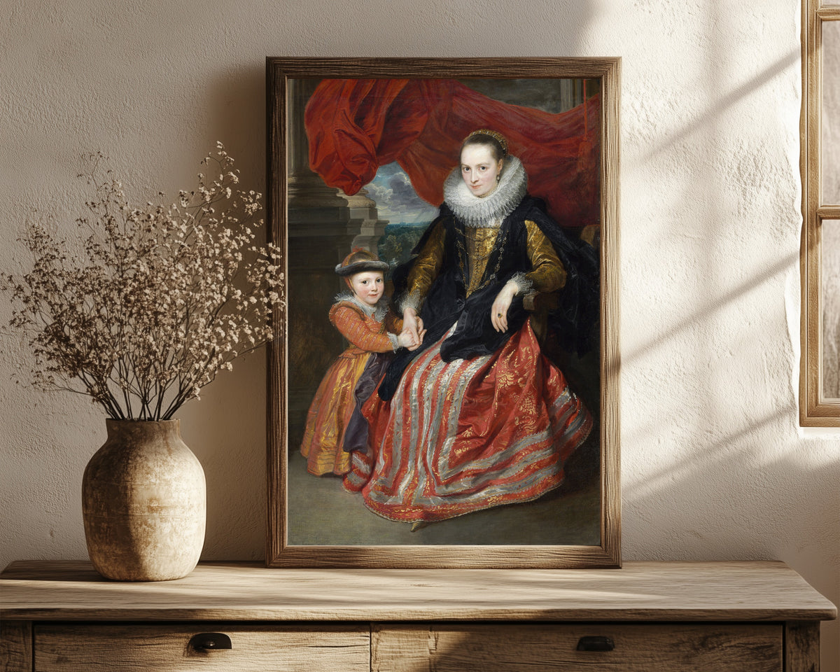 Framed art print of Susanna Fourment and Her Daughter by Anthony van Dyck, in a dark wood frame leaning on a rustic console beside dried flowers