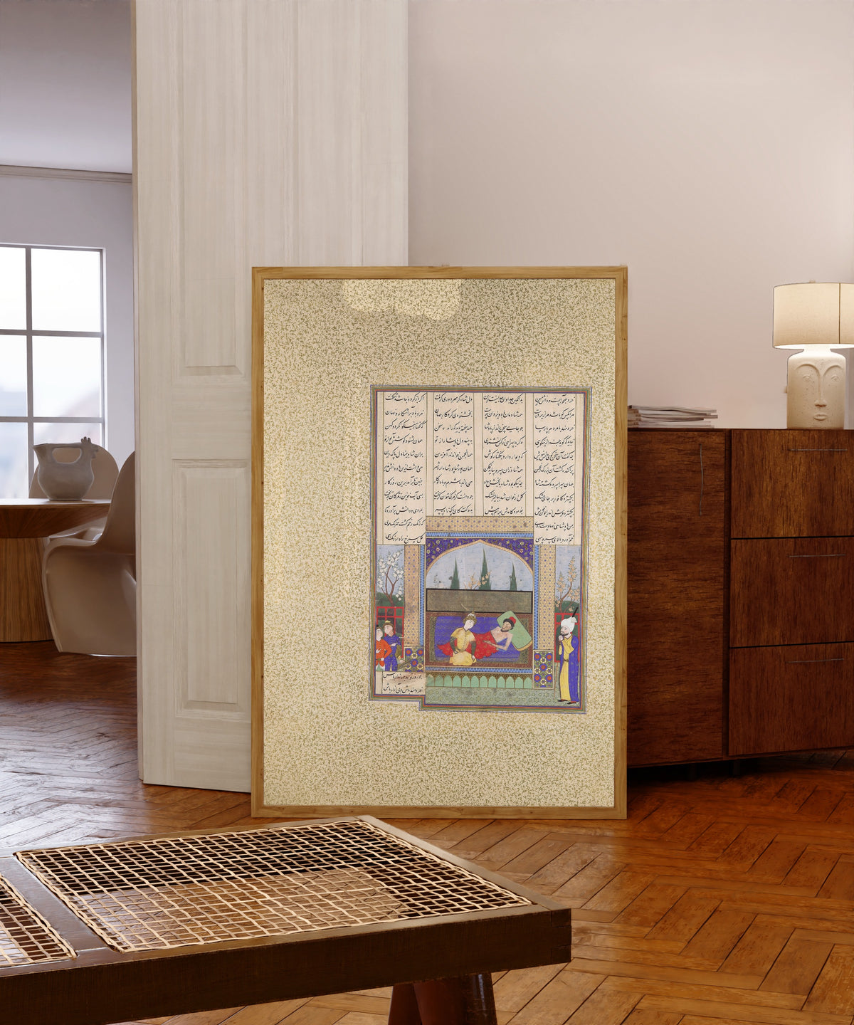 Framed art print of Shahnama of Shah Tahmasp: Hurmuzd I's Last… by Aqa Mirak (attributed), in a light wood frame leaning in a warm room with a parquet floor