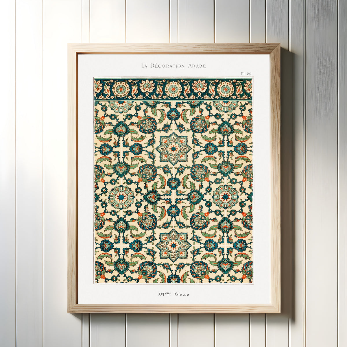 Framed art print of Arabian Pattern 23 by Prisse d'Avennes, in a light wood frame on a white panelled wall