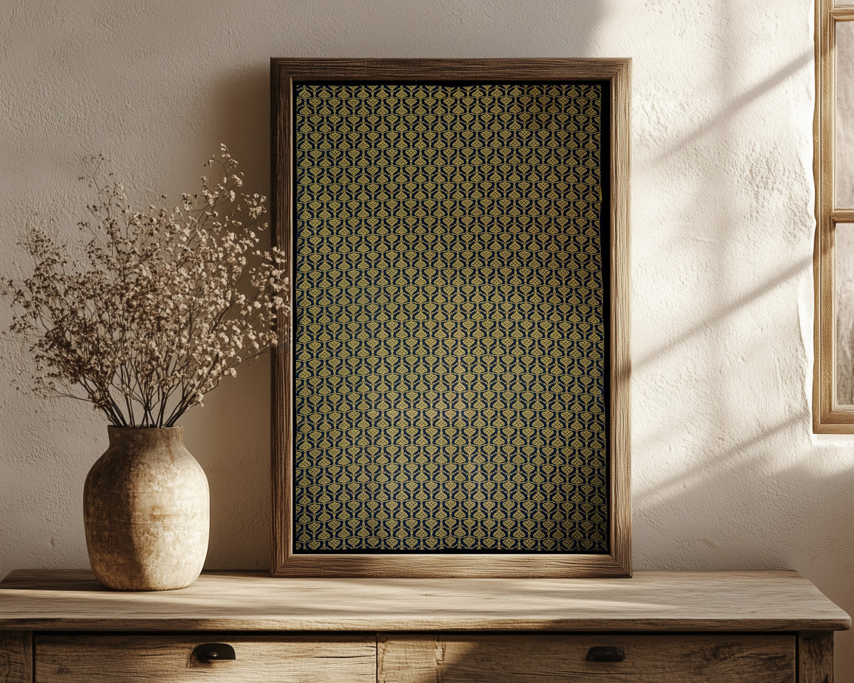 Framed art print of Wallpaper Design by Arthur Heygate Mackmurdo, in a dark wood frame leaning on a rustic console beside dried flowers