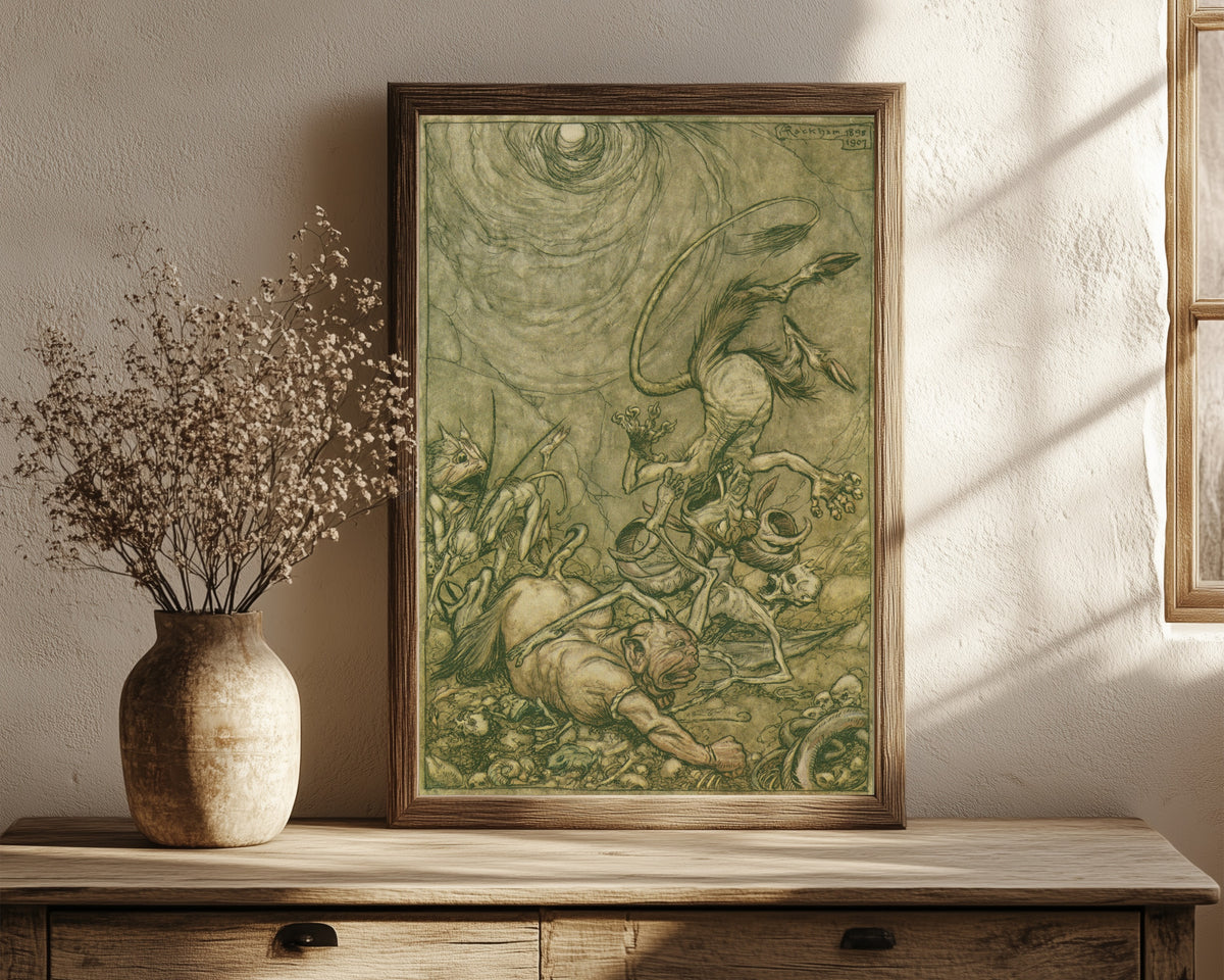 Framed art print of Into the Bottomless Pit He Fell Slap by Arthur Rackham, in a dark wood frame leaning on a rustic console beside dried flowers