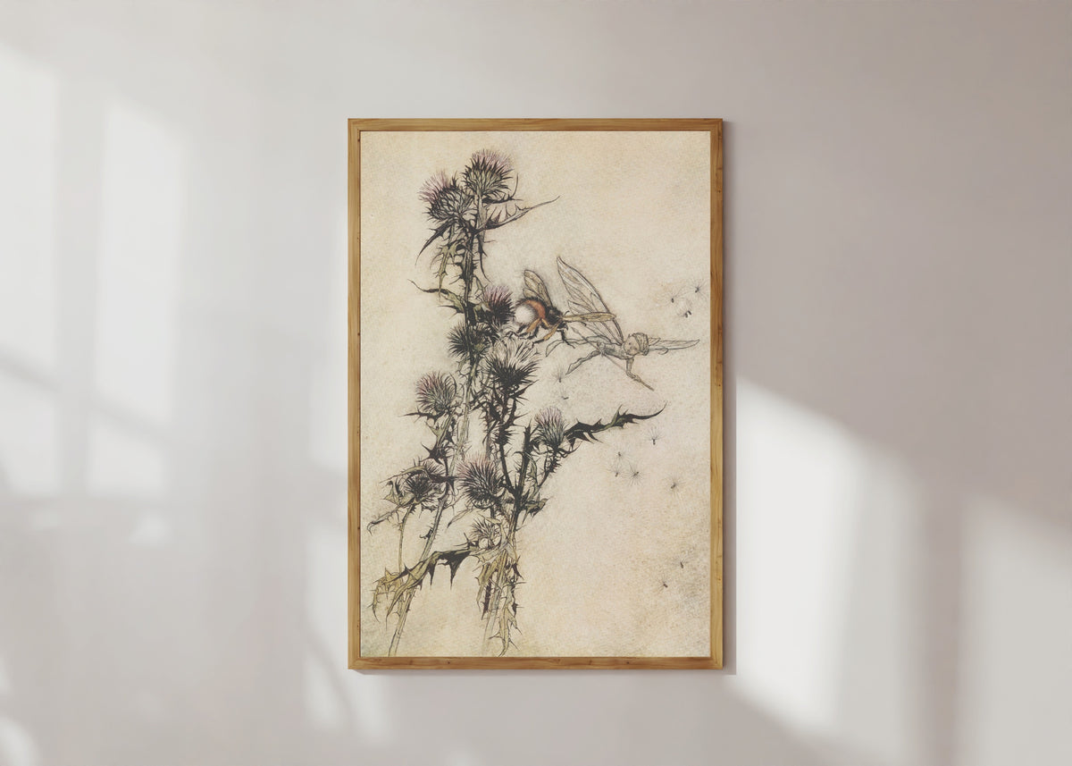 Framed art print of Kill Me a Red-Hipped Humble-Bee on the Top of a Thistle by Arthur Rackham, in a light wood frame on a sunlit white wall