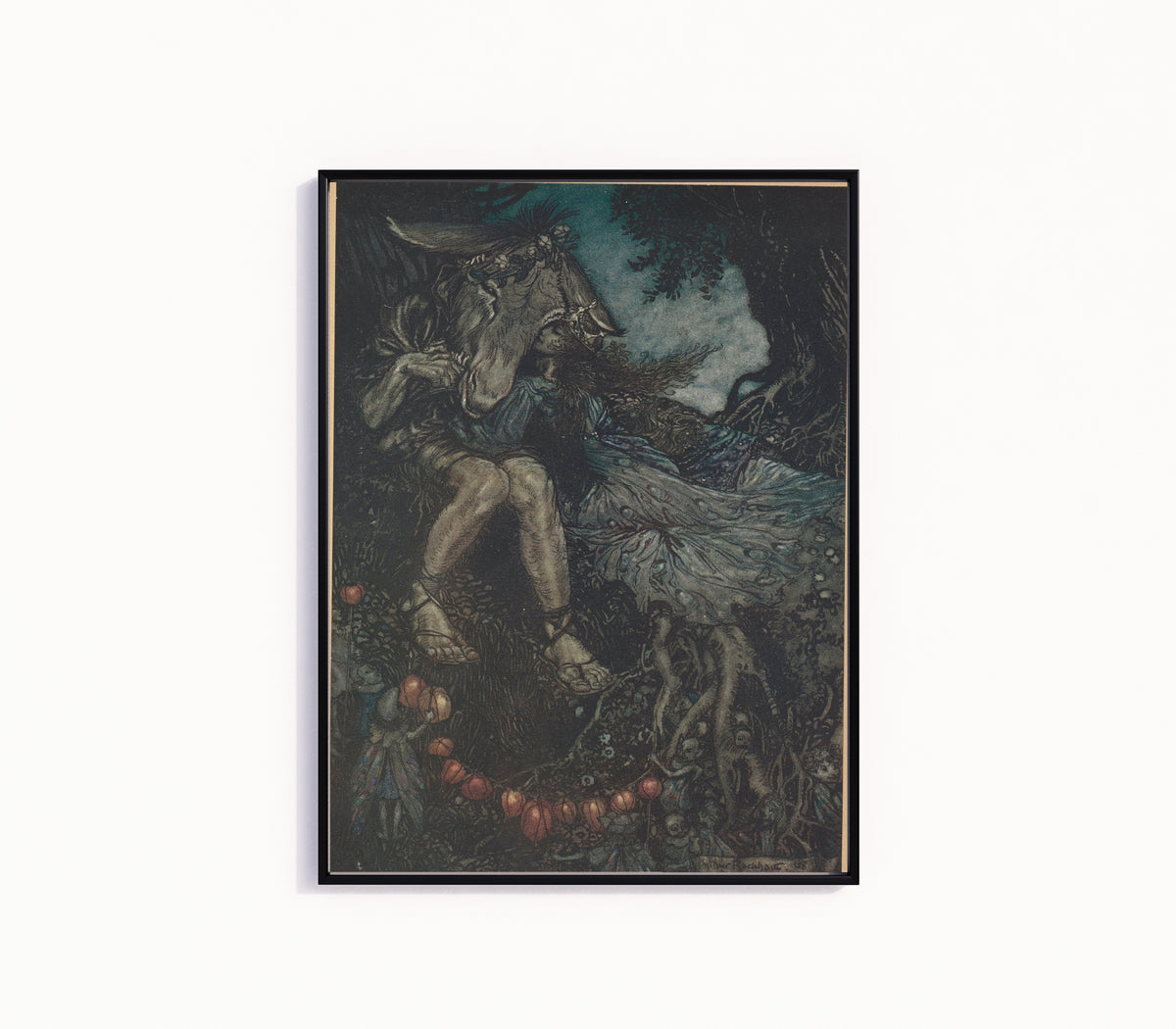Framed art print of Sleep Thou, and I Will Wind Thee in My Arms by Arthur Rackham, in a slim black frame on a plain white wall
