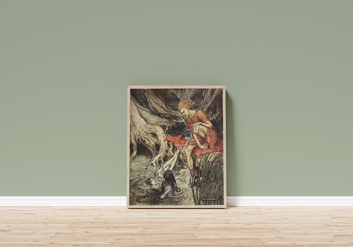 Framed art print of The Rhine's Pure-Gleaming Children Told Me of… by Arthur Rackham, in a light wood frame leaning on a sage green wall above a wooden floor