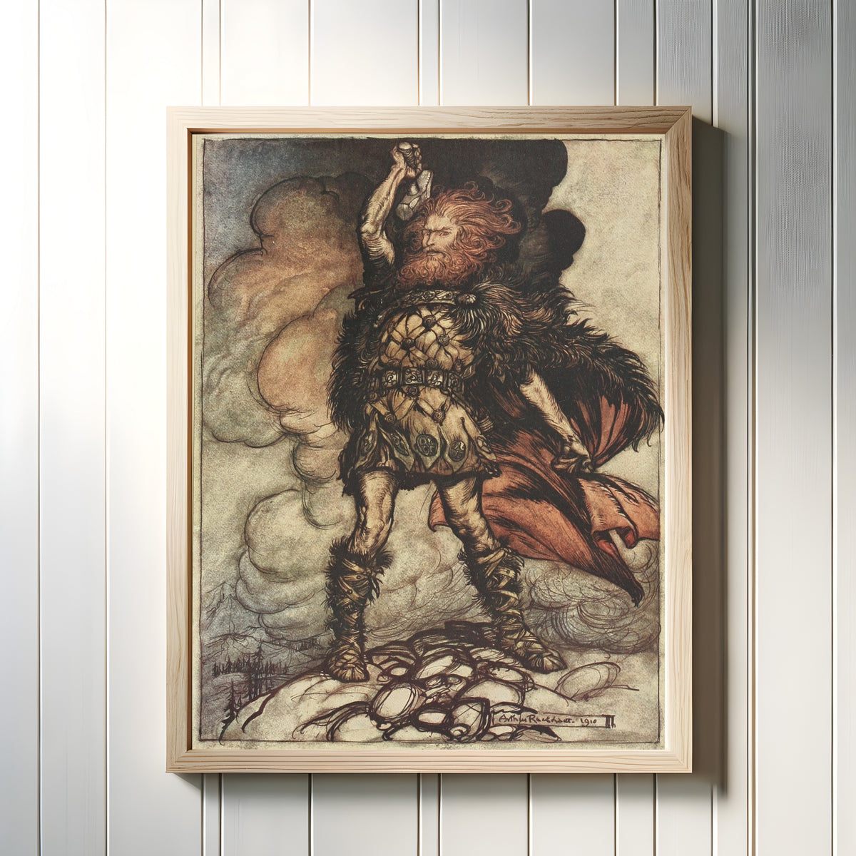 Framed art print of To My Hammer's Swing Hitherward Sweep Vapours and Fogs by Arthur Rackham, in a light wood frame on a white panelled wall