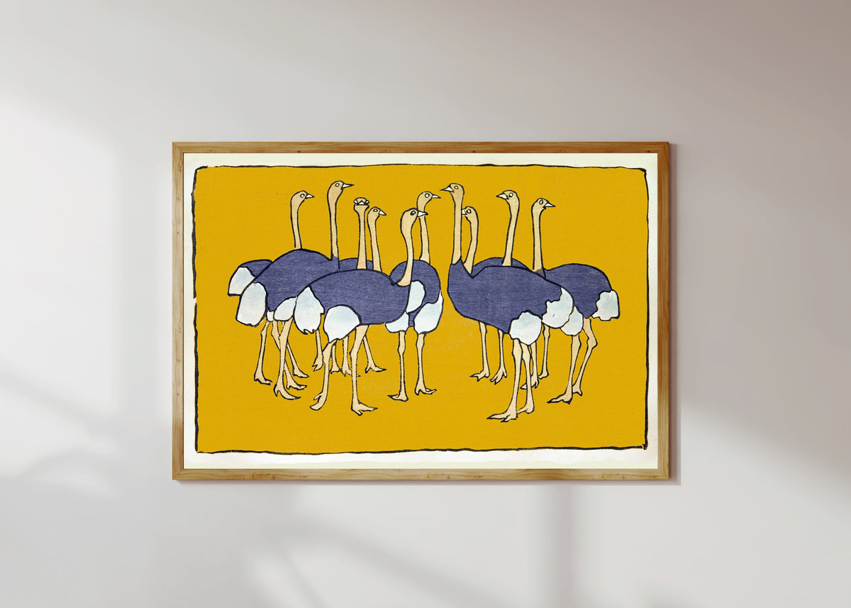 Framed art print of Ostriches by Asai Chū, in a light wood frame on a sunlit white wall