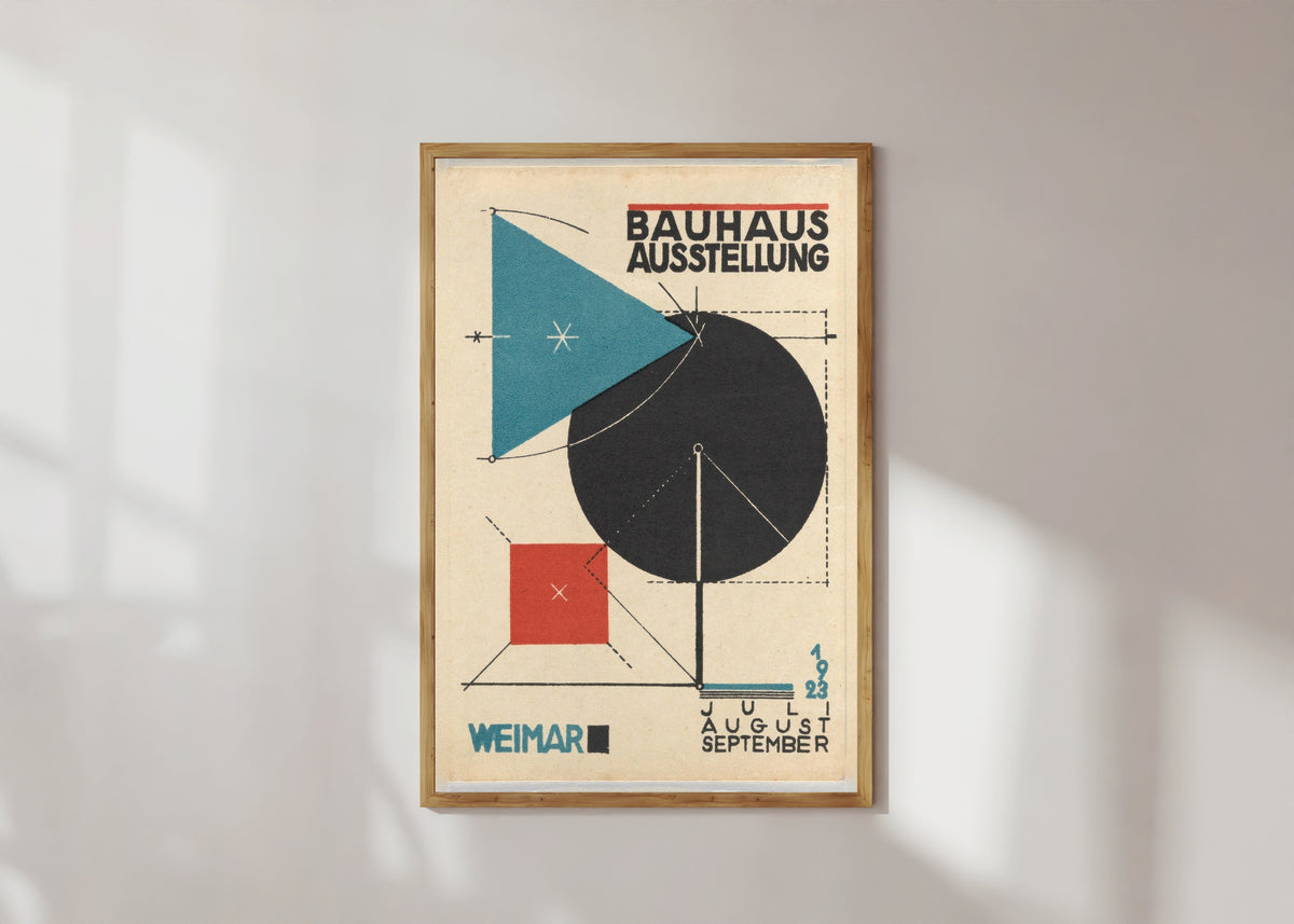 Framed art print of Ausstellung Poster by Bauhaus, in a light wood frame on a sunlit white wall
