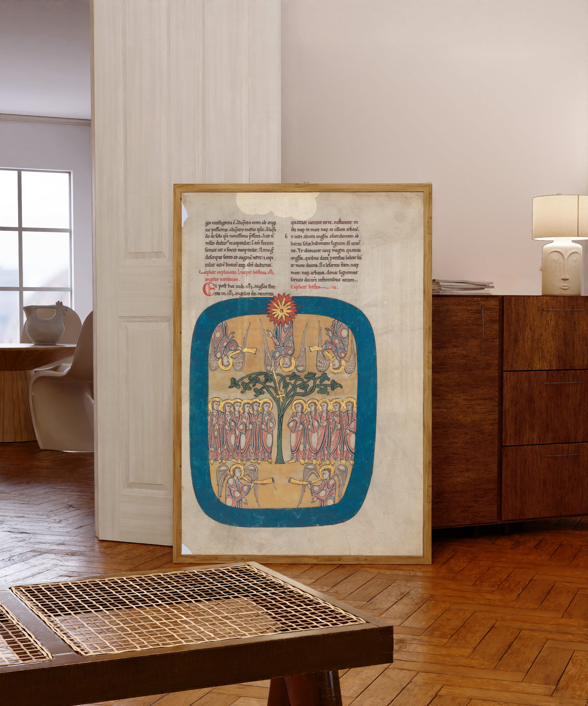 Framed art print of Beatus: Angels Restrain the Four Winds; the Angel Ascends from the…, in a light wood frame leaning in a warm room with a parquet floor